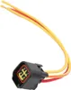 A close-up shot of a car part connector with wires. Náhľad obrázku produktu