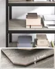 Shelving unit with boxes and a printer on the shelves, with a close-up of the shelf material thickness. Náhled obrázku produktu
