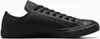 A black leather Converse Chuck Taylor All Star low-top sneaker is shown from the side against a white background. Náhled obrázku produktu