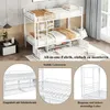 A collage of images showcasing a white metal bunk bed with storage, including close-ups of its features and a main shot of the assembled bed. Anteprima dell’immagine prodotto