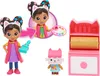A collage of a doll and its accessories, presented on a white background. Produktbild-Vorschau