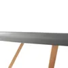 A close-up of a table top and legs. Náhled obrázku produktu