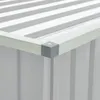 A close-up view of the corner of a storage box, showing a gray corner protector and the corrugated texture of the box and lid. Voir les images du produit