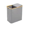 A grey fabric laundry sorter with a wooden rim and a lid, shown against a white background. Produktbild-Vorschau