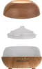 The image shows the disassembled parts of an aroma diffuser with a wood-grain finish. Náhled obrázku produktu