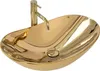 A golden oval basin sink with a golden faucet. Náhled obrázku produktu