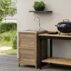An outdoor sink and grill setup on a patio. Produktbild-Vorschau