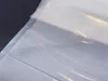A close-up view of a textured plastic material, likely a vacuum seal bag. Anteprima dell’immagine prodotto
