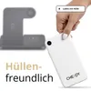 A hand holding a white smartphone, with a charging station in the background and text indicating "Hüllen-freundlich" (case-friendly). Produktbild-Vorschau