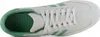 A top-down view of a white and green Adidas sneaker. Produktbild-Vorschau