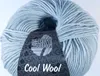 A ball of light blue yarn with a label. Produktbild-Vorschau