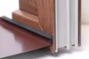 Close-up view of a window sill profile with a rubber seal and a metal drip edge. Náhled obrázku produktu