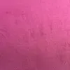 A close-up, textured view of fuchsia velvet fabric. Produktbild-Vorschau
