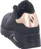 A close-up side view of a black Skechers sneaker with rose gold accents. Anteprima dell’immagine prodotto