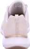 The back view of a beige Skechers sneaker. Voir les images du produit