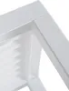 A close-up view of the corner of a white table, showing its slatted surface and frame. Voir les images du produit