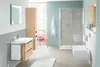 A modern, well-lit bathroom with a sink, vanity, toilet, bidet, and shower. Anteprima dell’immagine prodotto