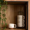 Súprava 4 porcelánových hrnčekov HELLO na kovovom Náhľad obrázku produktu 2