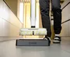 A person is using a floor cleaner in a kitchen. Anteprima dell’immagine prodotto