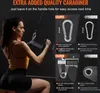A woman is using a lat pulldown attachment on a weight machine, with marketing graphics comparing the product's carabiner and buckle to competitors. Podgląd zdjęcia produktu