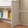 A close-up view of a shelf with storage bags and stacked items, part of a larger furniture piece. Náhled obrázku produktu