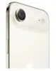 Close-up of the back of a white iPhone with a gold trim, showing the camera lens and the Apple logo. Produktbild-Vorschau