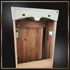 A close-up view of a bathroom vanity with a sink and wooden cabinet doors. Podgląd zdjęcia produktu