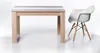 A wooden dining table with a white and gray striped tabletop, next to a white modern chair with wooden legs, on a white background. Produktbild-Vorschau