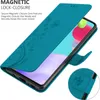 A teal flip phone case with a floral design is shown open, revealing a smartphone screen. A close-up inset shows a detail of the case closure. Voir les images du produit