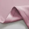 A close-up view of folded pink fabric, likely a curtain or textile. Produktbild-Vorschau