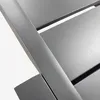 A close-up view of the textured surface and structure of a gray aluminum garden table. Anteprima dell’immagine prodotto