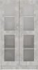 A tall, narrow cabinet with two glass doors, divided into four sections. Anteprima dell’immagine prodotto