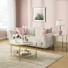 A living room scene with a couch, coffee table, and side table. Náhled obrázku produktu