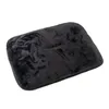 A black, plush dog car seat cover is shown from a slightly elevated angle against a white background. Anteprima dell’immagine prodotto