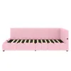 A pink upholstered bed frame with a slatted base, shown from the side. Náhled obrázku produktu