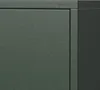 A close-up view of a green cabinet with a textured surface and a seam dividing two panels. A small inscription is visible on the top panel. Anteprima dell’immagine prodotto