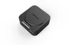 A black, square-shaped wireless charger with a circular indentation on top, resting on a white background. Podgląd zdjęcia produktu