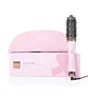 A pink GHD hair dryer brush and its packaging are displayed against a white background. Produktbild-Vorschau