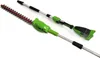 A green and silver electric hedge trimmer with a telescopic pole, shown against a white background. Náhľad obrázku produktu