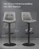 Two bar stools are shown side-by-side against a gray background. The stool on the left is shown at its lowest height, while the stool on the right is shown at its highest height and is also depicted as being able to rotate 360 degrees. Dimensions are indic Produktbild-Vorschau