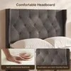 Close-up of a dark gray upholstered headboard with tufted details, accompanied by white pillows. Inset images highlight the soft texture of the headboard and the breathable fabric. Náhled obrázku produktu