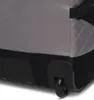 A close-up view of the bottom corner of a rolling suitcase, showing a wheel and part of the base. Voir les images du produit