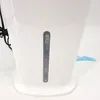 Close-up of a white appliance's water level indicator. Produktbild-Vorschau