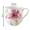 A white mug with a floral watercolor design and measurement indicators. Podgląd zdjęcia produktu