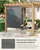 A grey roller blind is installed on a wooden pergola, providing shade and protection from the elements. The scene is set on a patio with outdoor furniture visible in the background. Náhled obrázku produktu