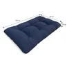A dark blue tufted cushion with dimensions indicated by lines and text. Voir les images du produit
