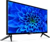A black television with a blue flower displayed on its screen, resting on a stand. Produktbild-Vorschau
