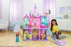 A young girl plays with a Disney Princess castle playset in a room. Podgląd zdjęcia produktu