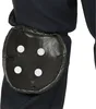 A close-up view of a black knee pad with four white circular accents, attached to dark fabric. Produktbild-Vorschau