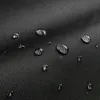 A close-up shot of water droplets on a black textured surface. Anteprima dell’immagine prodotto